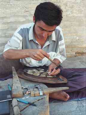 Khiva - Brazier at work